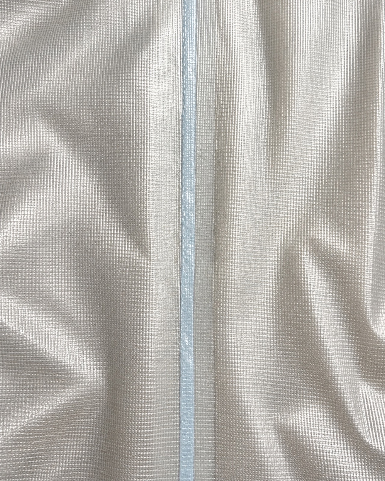 Seam tape on translucent 20D shell material